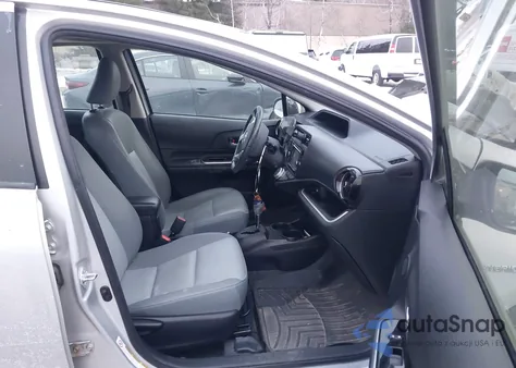 2015 Toyota Prius C Four from USA, damaged, VIN JTDKDTB37F1088893